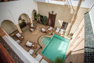 an overhead view of a swimming pool in a hotel at Riad Amira in Marrakech
