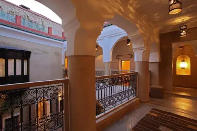 a hallway of a building with a balcony at Riad Dar Ten in Marrakech