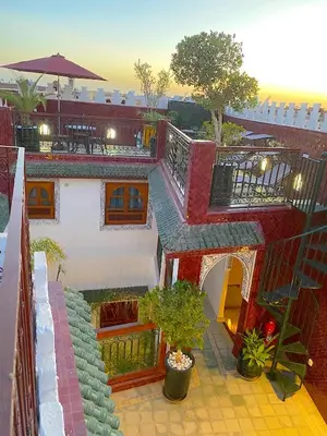 an aerial view of a house with a patio at Riad La Perle Rouge in Marrakech