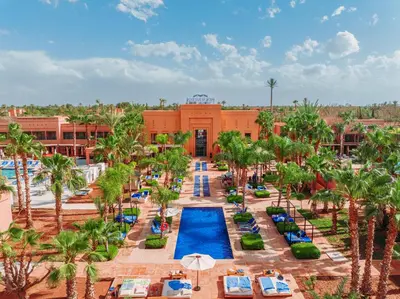 an aerial view of a resort with a swimming pool at Pickalbatros Hôtel Du Golf - Adults Friendly 16 Years Plus- All-Inclusive in Marrakech