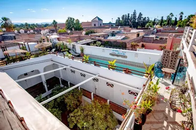 an overhead view of a building with plants on the roof at Riad Villa Almeria Hotel & Spa in Marrakech