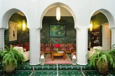 a lobby with couches and a table at Riad Vert in Marrakech