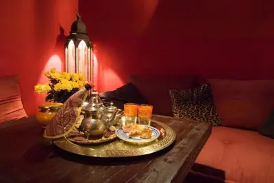 a table with a tray of food and drinks on it at La Terrasse Des Oliviers in Marrakech