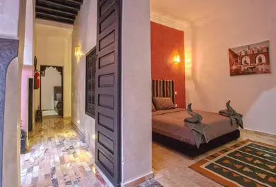 a bedroom with a bed in a room at Riad Leila Marrakech in Marrakech
