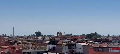 a view of a city with houses and buildings at Riad Hayed in Marrakech