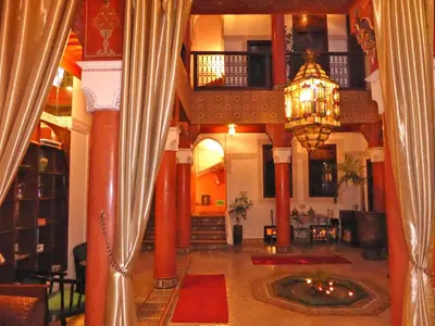 a lobby of a hotel with a chandelier at Riad Lila in Marrakech