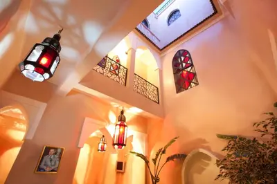 a church with two lights and stained glass windows at Riad Le Rubis in Marrakech