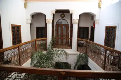 a balcony of a house with some plants at Riad Villa El Arsa in Marrakech