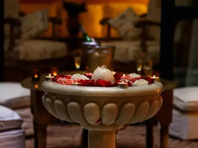 a table with candles on top of a table at Riad Soundouss in Marrakech