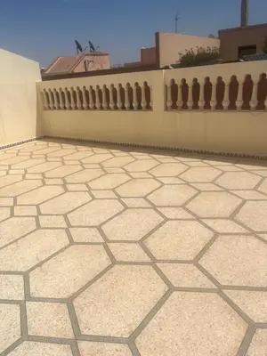 a tiled floor in front of a fence at GoodLife House in Marrakech