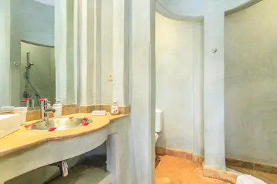 a bathroom with a sink and a toilet at Villa 69 Samanah Golf Country Club in Ala el Ma