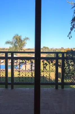 a view of the water from a balcony at Villa 69 Samanah Golf Country Club in Ala el Ma