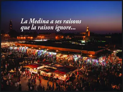 a crowd of people standing around a market at night at Samira Group & Spa in Marrakech