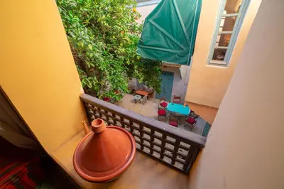 an overhead view of a balcony with a vase at Riad Dar Marhaba in Marrakech