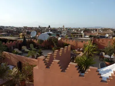 a view of a city from the roof of a building at Riad Ifoulki in Marrakech