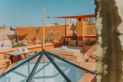 a view of a patio from the roof of a house at Dar Akal in Marrakech