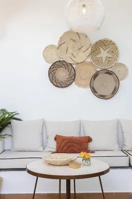 a living room with a couch and a table at Riad M17 - Hammam & Spa in Marrakech