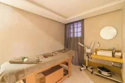 a hospital room with a bed and a sink at BnB MEDINA in Marrakech