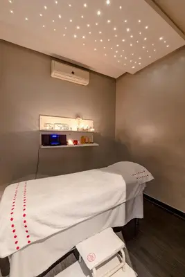 a hospital room with a bed and lights on the ceiling at Residence Dar Lamia Marrakech in Dar Caïd Layadi