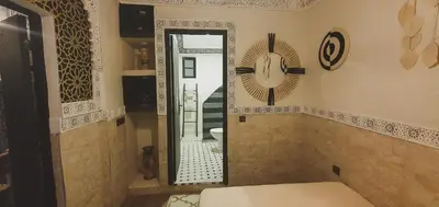 a bathroom with a mirror and a toilet in it at Be Nomad in Marrakech