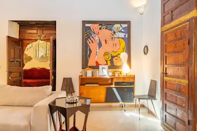 a living room with a couch and a table at Maison Du Tresor in Marrakech
