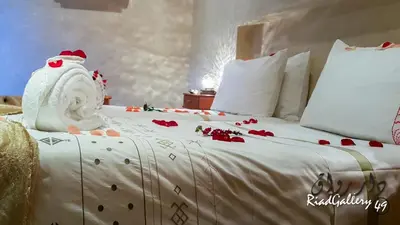 a bed with a santa claus on top of it at Riad Gallery 49 & Spa in Marrakech