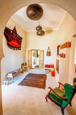 a living room filled with furniture and a rug at SA FONDA in Tameslouht