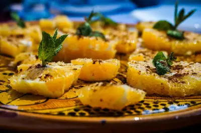 a plate of food with a bunch of food on it at Riad Orange in Marrakech
