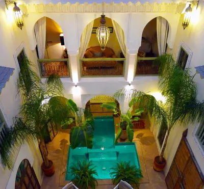 an overhead view of a pool in a house with plants at Riad Palacio De Las Especias in Marrakech