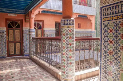 a balcony of a building with colorful tiles at Ryad Hamza in Marrakech