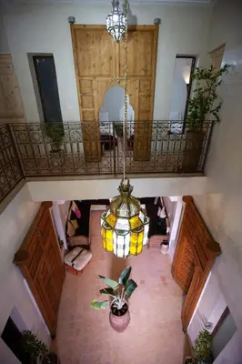 an overhead view of a room with a chandelier at Riad Taziri in Marrakech