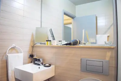 a bathroom with a sink and a mirror at Apartment in Marrakesh, Gueliz in Marrakech