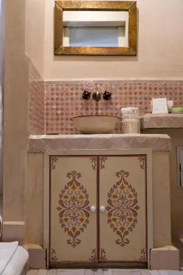 a bathroom with a sink and a mirror at Riad Beata Bed & Breakfast in Marrakech
