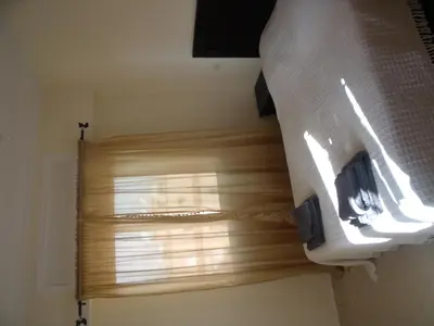 a window in a room with a blind on it at Appartement Aïda in Marrakech