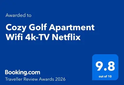 a blue sign that says cozy golf apartment with tv netflix at Cozy Golf Apartment Wifi 4k-TV Netflix in Marrakech