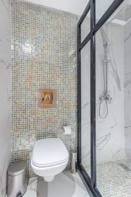 a bathroom with a toilet and a shower at Best for group, 5 min from medina in Marrakech