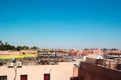 a view of a city from the top of a building at Riad Hôtel Marraplace in Marrakech