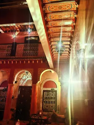 a building with a chandelier hanging from a ceiling at Riad Naya in Marrakech