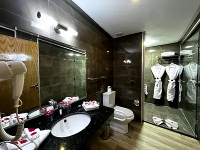 a bathroom with a sink and a toilet at Stars Hotel & Spa in Marrakech