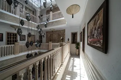 a hallway of a house with stairs and a ceiling at Riad Wazani Square & SPA in Marrakech