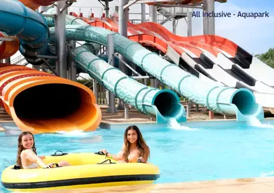 two girls in the water at an indoor water park at Valeria Dar Atlas All Inclusive in Marrakech