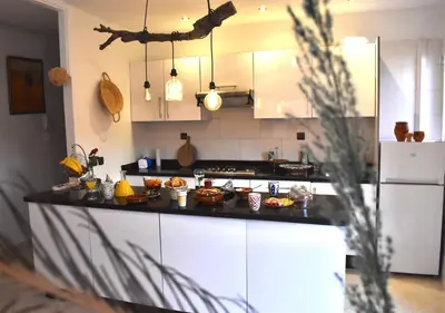 a kitchen with a counter with food on it at COSY LUXURY Apartment - GUELIZ in Marrakech