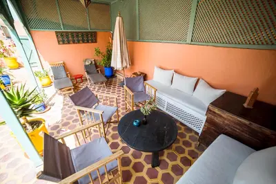 an overhead view of a room with a table and chairs at Riad Inaka in Marrakech