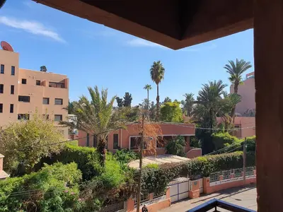 a view from the balcony of a house at Majorelle Garden Retreat 2BR Apartment Near Jardin Majorelle in Marrakech