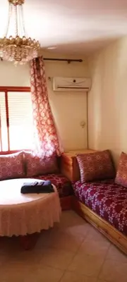 a room with two beds and a window at Twins 13 in Marrakech