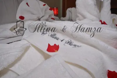 a close up of towels on a bed at Illina & Hamza Apartment in Marrakech