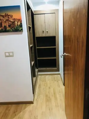 an open door to a room with a closet at SUNNY 48- Appart Cozy -Marrakech-centre in Marrakech
