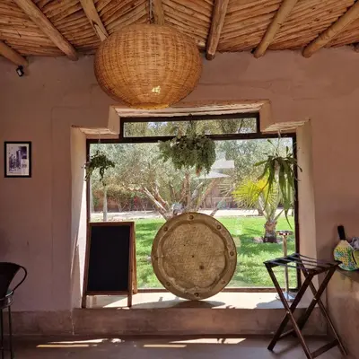 a room with a window with a large basket at Hôtel Dar 55 - Berber House - Boutique Hôtel in Marrakech