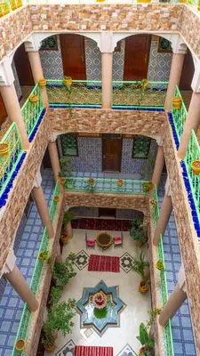 an overhead view of a building with a courtyard at Hotel imouzzer in Marrakech