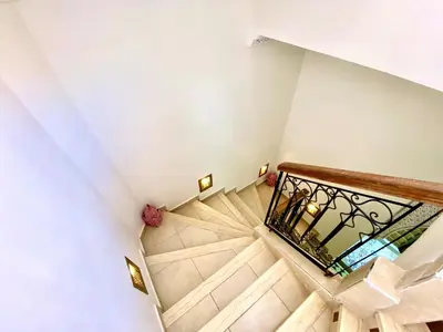 an overhead view of a staircase in a house at Riad Nouhal in Marrakech